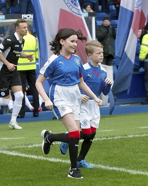 Rangers Mascots in Action: A Exciting Moment at Ibrox Stadium during the Rangers vs. Queen of the South Match in the Ladbrokes Championship (Scottish Cup Winners 2003)