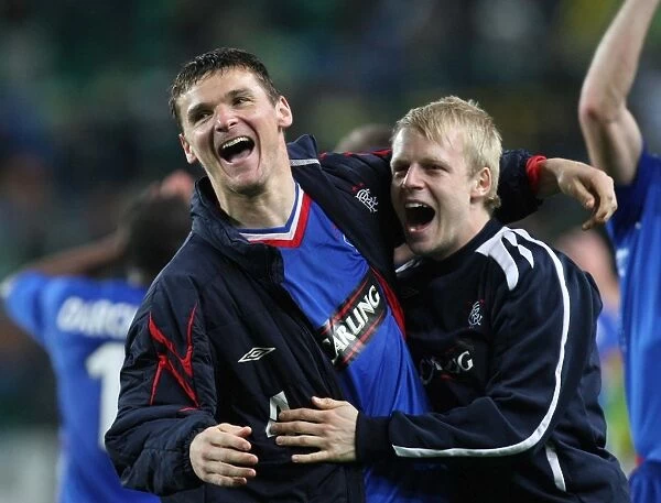 Rangers McCulloch and Naismith Celebrate 2-0 Quarter-Final Lead Over Sporting Lisbon