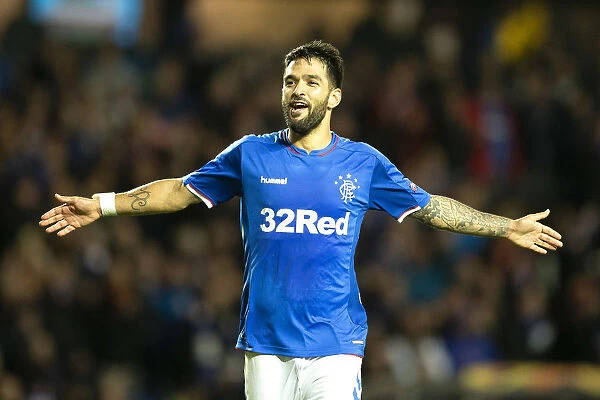 Rangers: Morelos and Candeias Celebrate Double Strike Against Rapid Vienna in Europa League at Ibrox Stadium