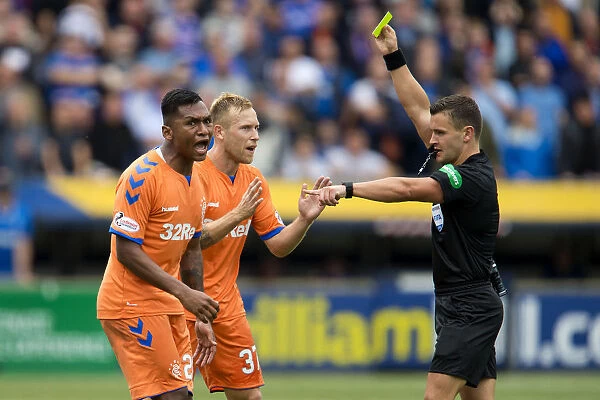 Rangers Morelos Receives Yellow Card from Referee Walsh at Rugby Park