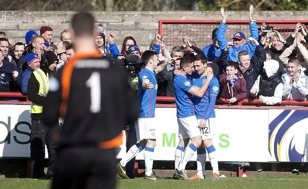Rangers Nicky Clark Doubles Up: Jubilant Moment with Team Mates in Scottish League One Victory against Brechin City