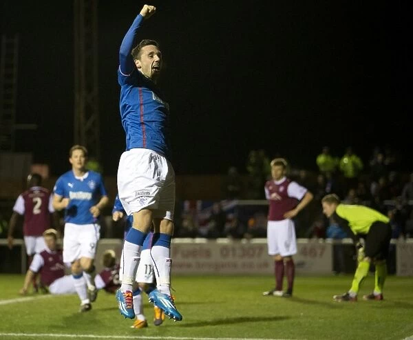 Rangers Nicky Clark Rejoices in Scottish League One Goal Against Arbroath