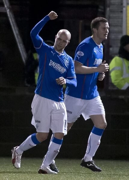 Rangers Nicky Law: Double Goal Delight in Scottish Cup Victory at Ochilview Park (2003)