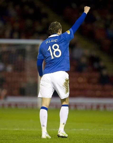 Rangers Nikica Jelavic: Celebrating the Opener in Aberdeen's Pittodrie Stadium (0-1 Rangers, Clydesdale Bank Scottish Premier League)