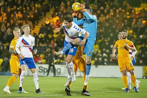 Rangers Nikola Katic Leaps for the Ball in Scottish Premiership Clash at Livingston's Tony Macaroni Arena