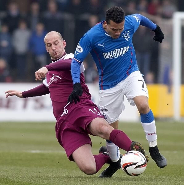 Rangers Peralta Tackled by Sheerin in Scottish League One Clash