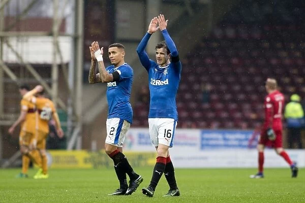 Rangers Players Tavernier and Halliday Celebrate Motherwell Victory with Fans
