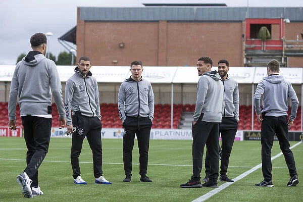 Rangers Players Unite Before Kick-off at Hamilton Academical's Hope Central Business District Stadium