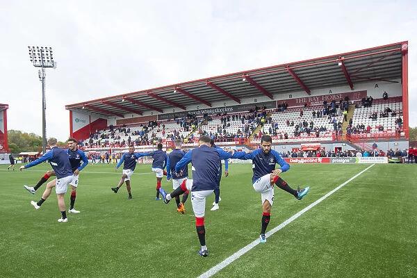 Rangers Players Warm Up Ahead of Hamilton Academical Clash at Hope Central Business District Stadium