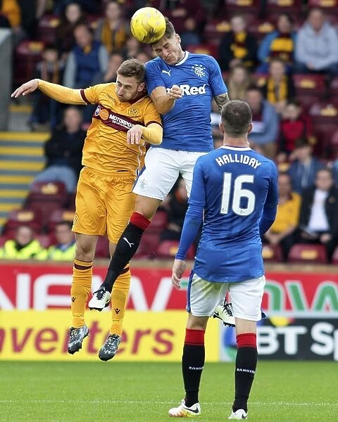 Rangers Rob Kiernan Clears the Ball in Intense Betfred Cup Clash at Motherwell