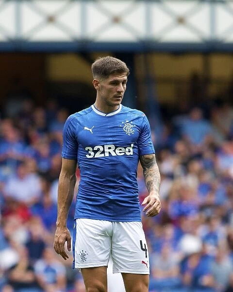 Rangers Rob Kiernan Honors Scottish Cup Tradition at Ibrox Stadium: A Tribute to Past Glories (Rangers vs. Annan Athletic, Betfred Cup)