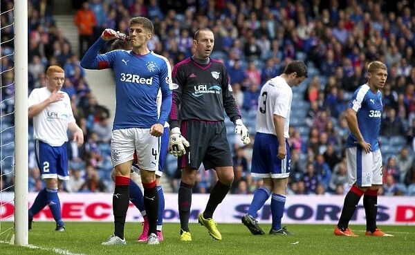 Rangers Rob Kiernan Relaxes with a Drink Amidst League Cup Action at Ibrox Stadium