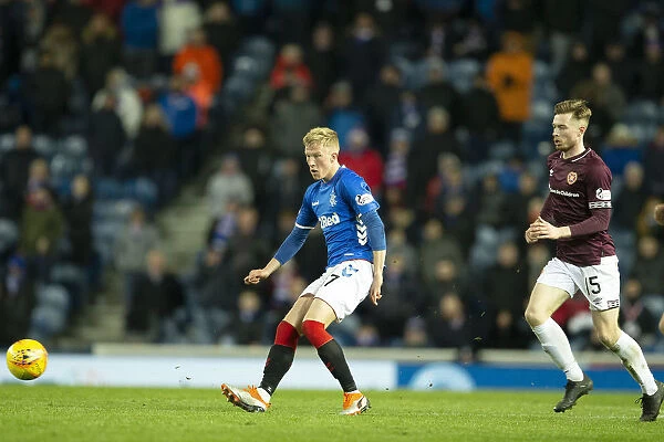 Rangers Ross McCrorie in Action: Scottish Premiership Clash Against Hearts at Ibrox Stadium