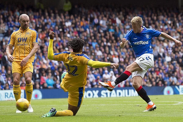 Rangers Ross McCrorie Aims for Victory: Pre-Season Clash at Ibrox vs. Wigan Athletic (Scottish Cup Champions)