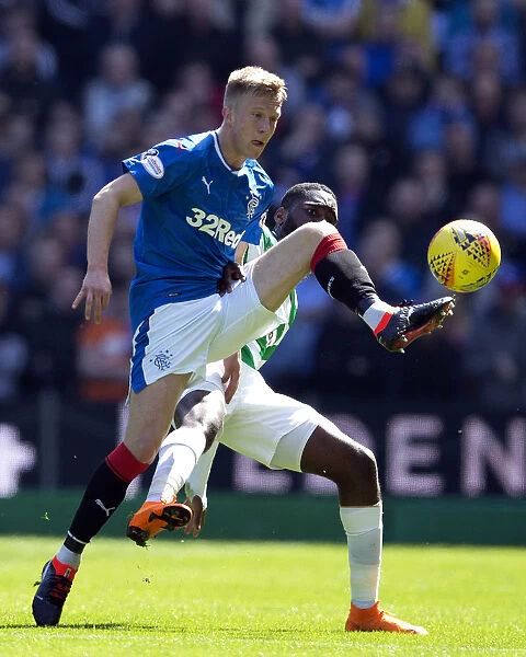 Rangers Ross McCrorie Fights for Possession: Intense Scottish Derby at Celtic Park