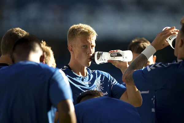 Rangers Ross McCrorie Soaks Up the Atmosphere at Ibrox Stadium During Pre-Season Friendly Against Bury (Scottish Cup Champions)