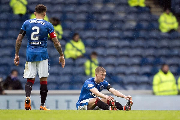 Rangers Ross McCrorie Suffers Injury During Rangers vs Dundee Match at Ibrox Stadium