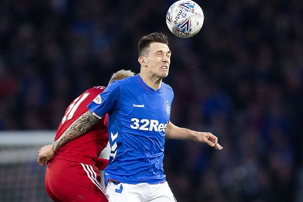 Rangers Ryan Jack Heads the Ball in Betfred Cup Semi-Final Showdown at Hampden Park