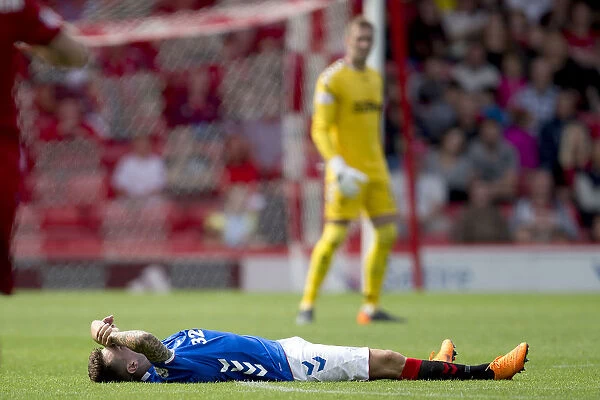 Rangers Ryan Jack Suffers Injury in Intense Clash with Aberdeen's Stevie May (Ladbrokes Premiership, Pittodrie Stadium)