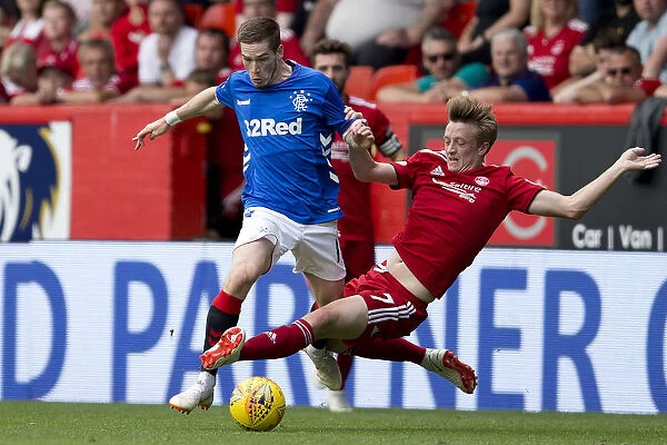 Rangers Ryan Kent Foul by Aberdeen's Chris Forrester in Ladbrokes Premiership Match