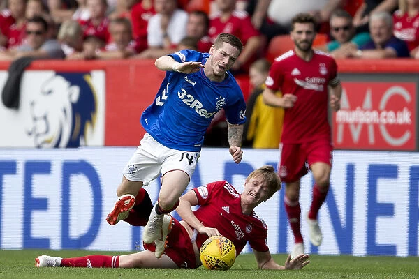 Rangers Ryan Kent Fouled by Aberdeen's Chris Forrester in Ladbrokes Premiership Match