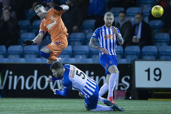 Rangers Ryan Kent Tackled by Kirk Broadfoot in Fifth Round Scottish Cup Clash at Rugby Park