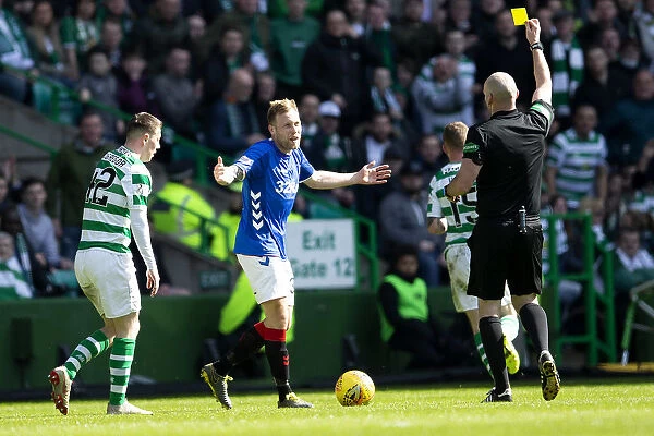 Rangers Scott Arfield Faces a Yellow Card Against Celtic in Scottish Premiership Clash at Celtic Park
