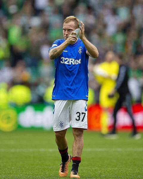Rangers Scott Arfield Pays Emotional Tribute to Celtic Fans: A Heartfelt Applause at Celtic Park