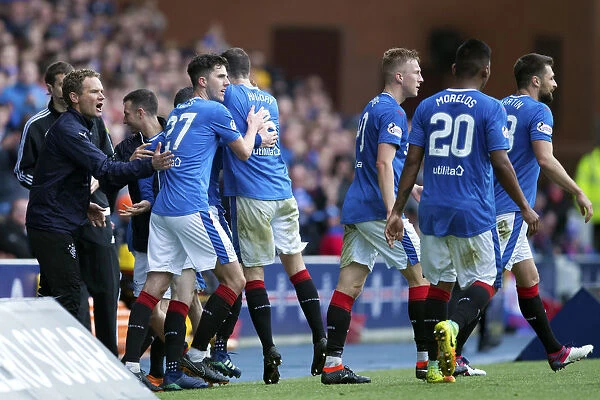 Rangers Sean Goss and David Bates: A Jubilant Moment as They Celebrate Goal Against Kilmarnock at Ibrox Stadium