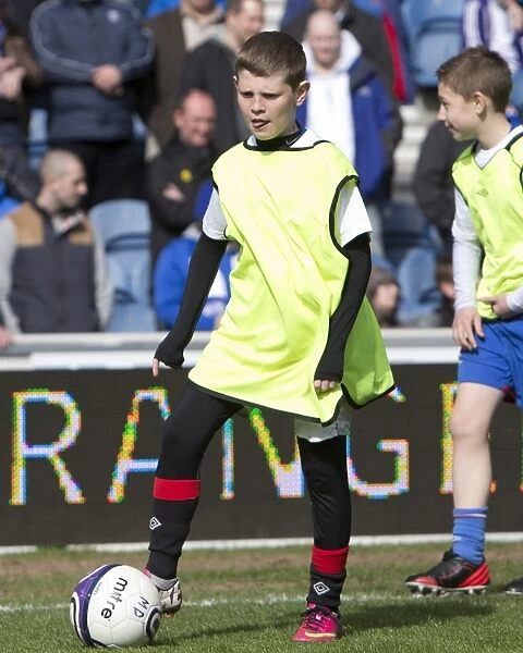 Rangers Soccer School Kids Bring Half-Time Entertainment to Ibrox: A Delightful Moment Amidst Rangers vs. Peterhead's Scottish Third Division Match