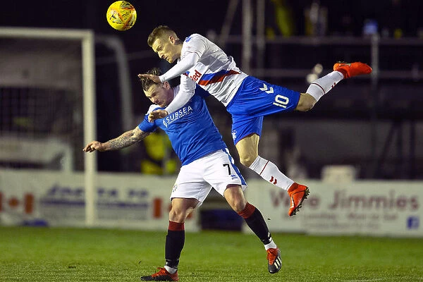Rangers Steven Davis Leaps Over Cowdenbeath's David Cox in Scottish Cup Fourth Round Clash