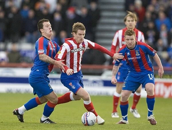 Rangers Steven Davis Outmaneuvers Inverness Caley Thistle Defenders in SPL Clash
