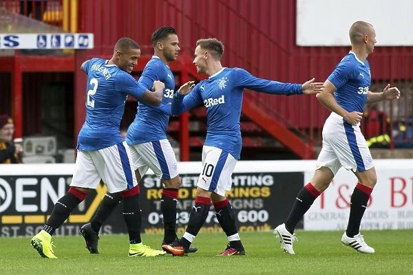 Rangers Tavernier and McKay: A Celebratory Moment in the Betfred Cup Match against Motherwell