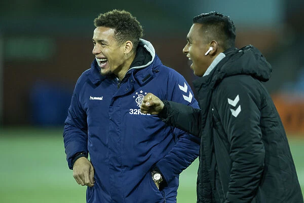 Rangers Tavernier and Morelos: A Playful Moment Amidst Rugby Park Rivalry (Scottish Premiership Champions 2003)