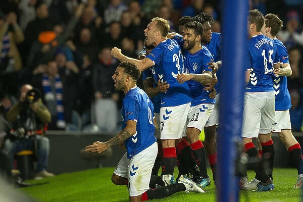 Rangers Tavernier Scores and Celebrates in Europa League Victory over Rapid Vienna at Ibrox Stadium