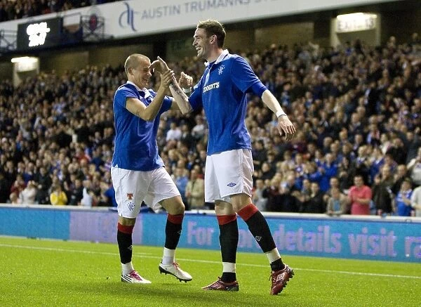 Rangers Thrilling 7-2 Victory: Lafferty and Weiss Celebrate Goals at Ibrox Stadium