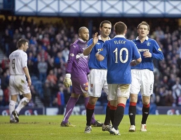 Rangers Triumph: Healy, Davis, and Fleck Celebrate Jelavic's Hat-Trick in a 6-0 Victory