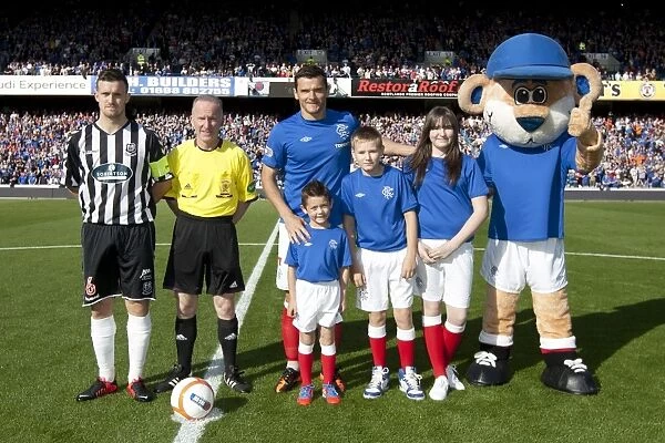 Rangers Triumph: Lee McCulloch and Mascots Celebrate Epic 5-1 Victory over Elgin City at Ibrox Stadium