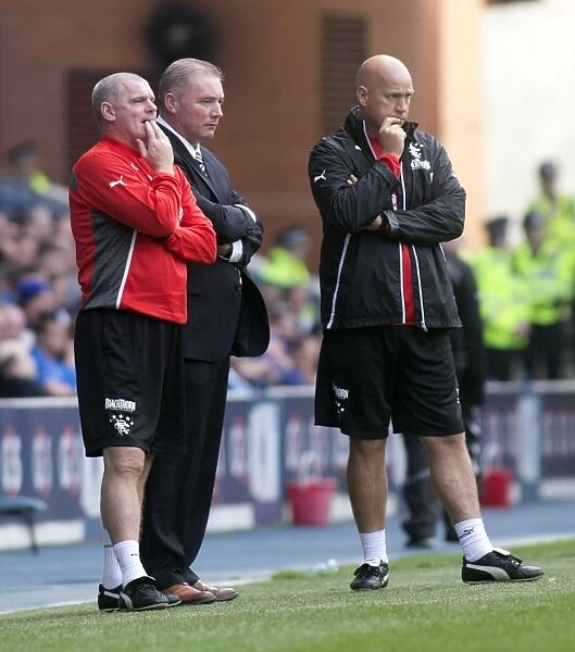 Rangers Triumph: McCoist, McDowall, and Durrant Bask in the Glory of an 8-0 Victory at Ibrox Stadium