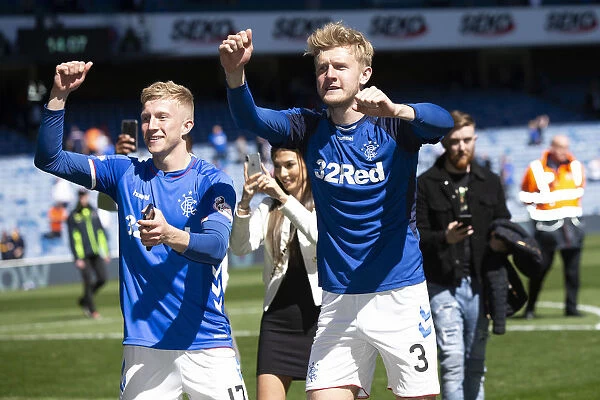 Rangers Triumph: McCrorie and Worrall Rejoice in Scottish Premiership Victory at Ibrox Stadium