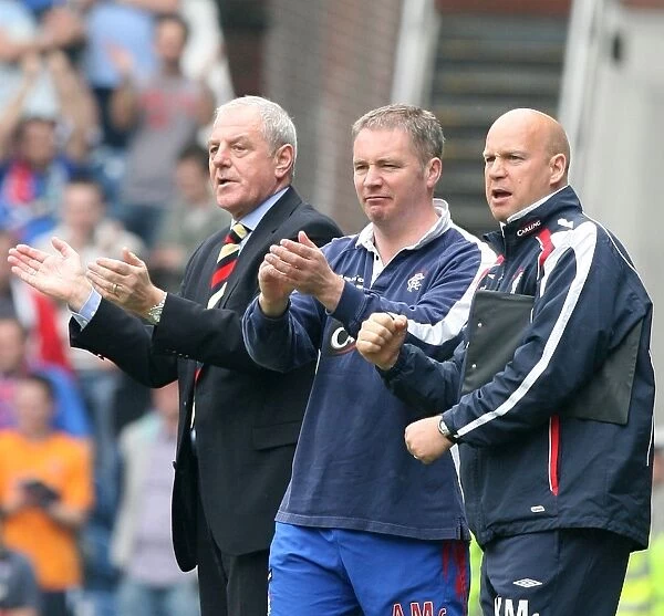 Rangers Triumph: Smith, McCoist, and McDowall Celebrate 3-1 Victory Over Dundee United at Ibrox