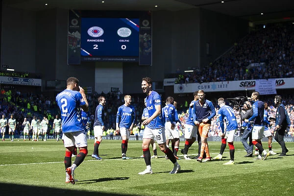 Rangers Triumph: Tavernier and Katic Celebrate Scottish Premiership Victory at Ibrox Stadium