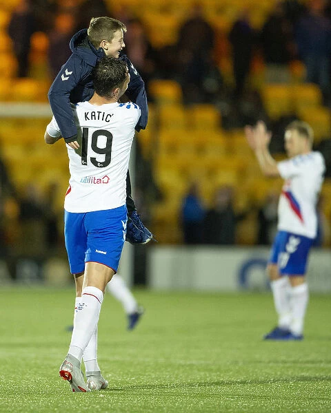 Rangers Victory: Nikola Katic and Fan Celebrate at The Tony Macaroni Arena after Livingston Clash - Scottish Premiership