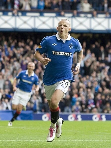 Rangers Vladimir Weiss: A Celebration of Goal Number Four in SPL's Thrilling 4-1 Victory over Motherwell at Ibrox Stadium