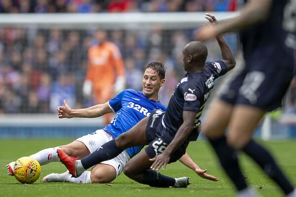 Rangers vs Dundee: Nikola Katic Tackles Kharl Madianga - Ladbrokes Premiership Clash at Ibrox Stadium