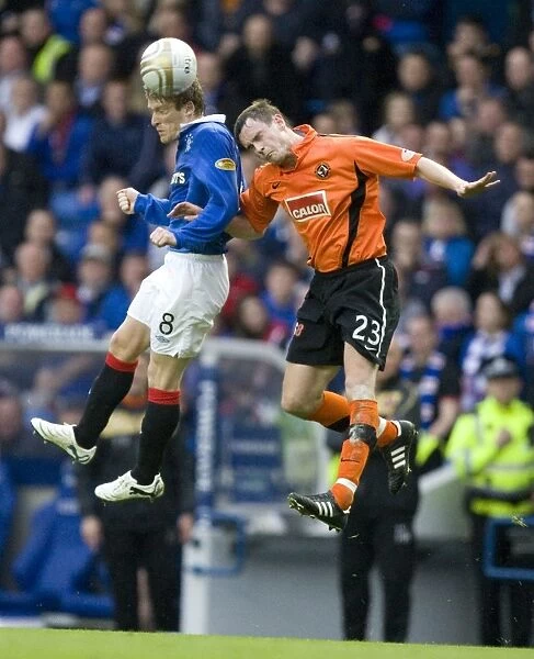 Rangers vs Dundee United: Stevenson and Watson Clash at Ibrox Stadium - Rangers Ahead 2-0 in Clydesdale Bank Scottish Premier League