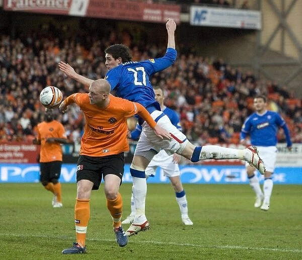 Rangers vs Dundee United: A Tie at Tannadice Park - Kyle Lafferty's Leap Over Garry Kenneth