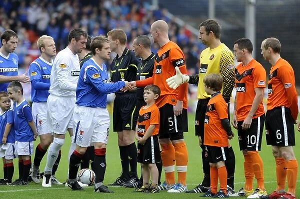 Rangers vs. Dundee United: United Players and Rangers Players Shake Hands Before Kick-off at Tannadice Stadium (1-0) in Favor of Fair Play