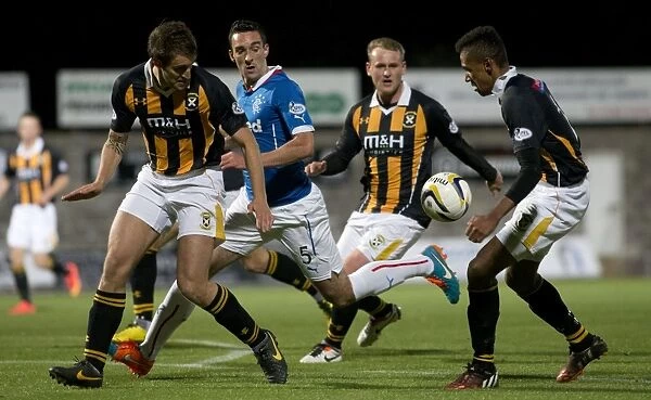 Rangers vs East Fife: Lee Wallace's Intense Battle for the Ball in Petrofac Training Cup Quarterfinal at Bayview Stadium