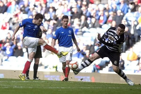 Rangers vs East Stirlingshire: Andy Little's Goal Attempt Thwarted by Richard Miller in Scottish Third Division (3-1)